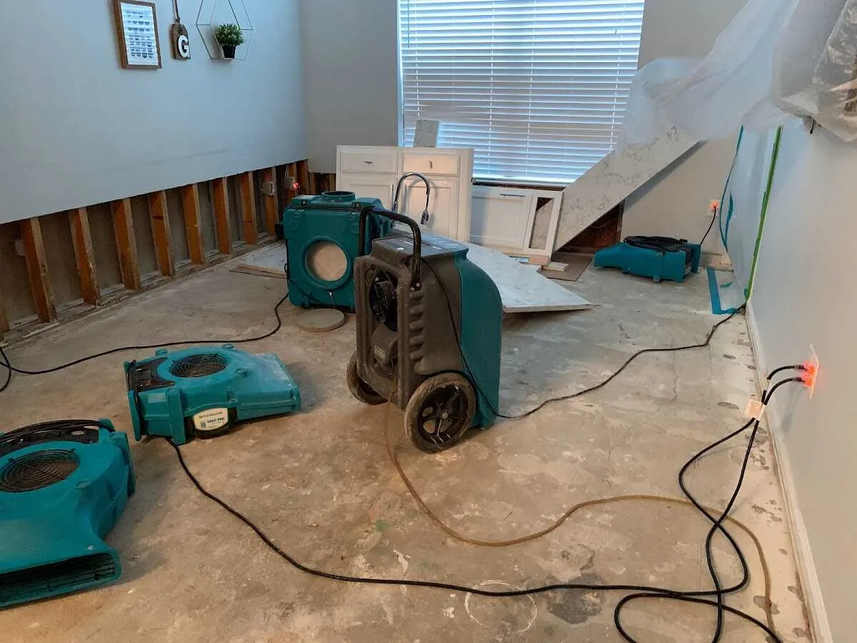Dehumidifier in flood-cut room for Water Damage Restoration in Cuyahoga Falls